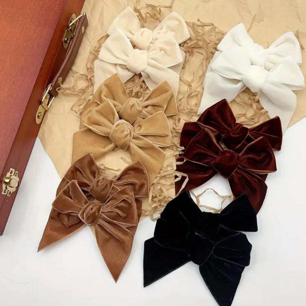 A Pair of Velvet hair Bow with clip